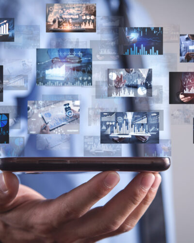 Man holding a digital pictures of business graphs. Business. Technology